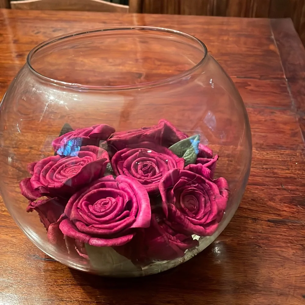 Handcrafted glass bowl with 17 silk or paper roses set in resin.